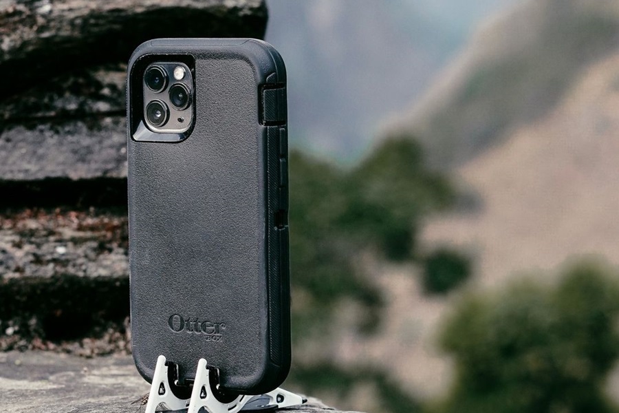Just what is the Difference between Otterbox Defender and Commuter Cases an Otterbox Case on a Small Stand Outdoors
