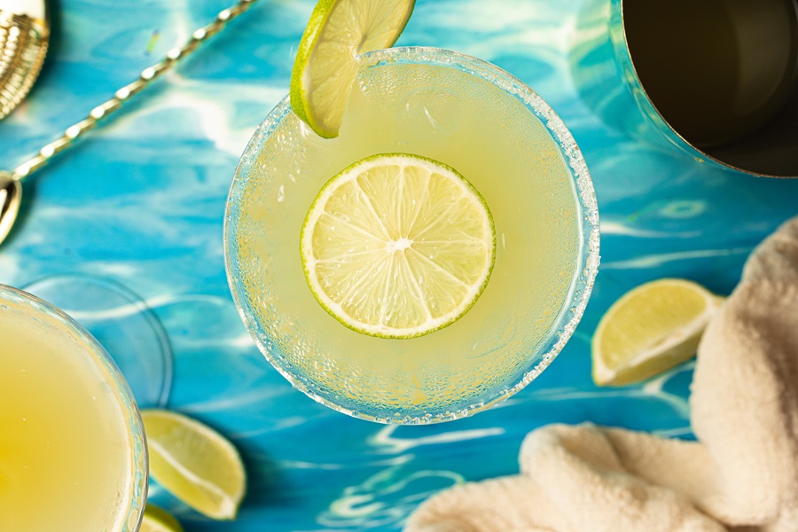 Nearly NorCal Margarita Recipe Overhead View of a Cocktail Glass Filled with Margarita and Topped with a Lime Slice