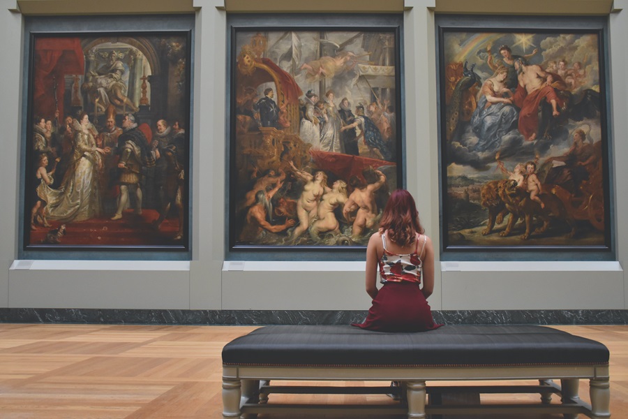 Things To Do in Los Angeles for Families a Woman Sitting in Front of Paintings in a Museum