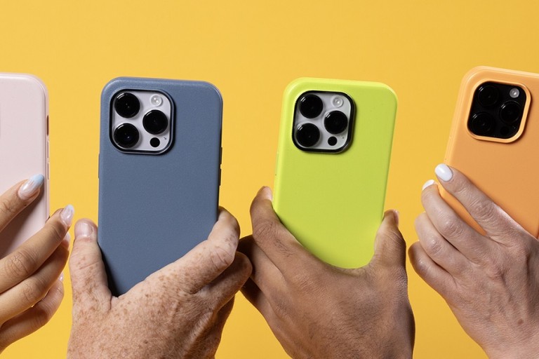 What is the Difference between Otterbox Cases Close Up of Different People's Hands Raised High in a Row Each Holding a Different Colored Otterbox Case