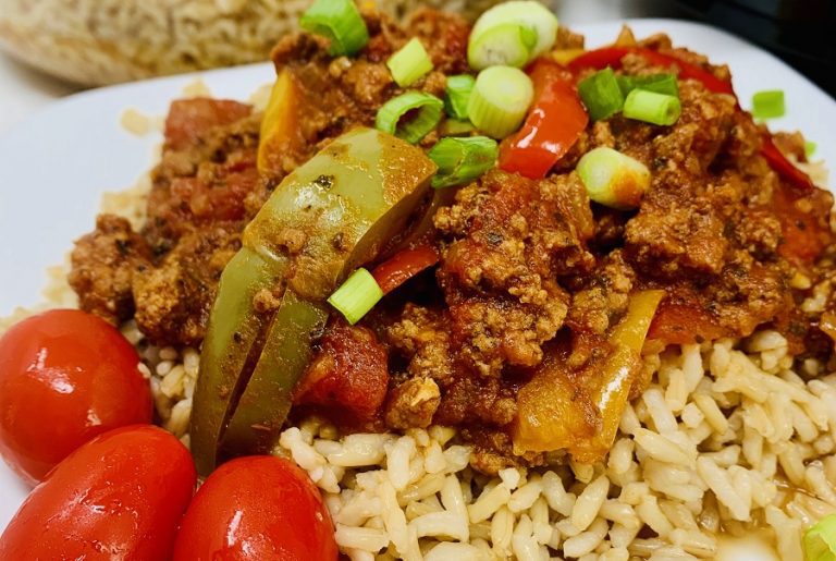 Slow Cooker Beef and Brown Rice Recipe Close Up of Beef and Rice on a Plate