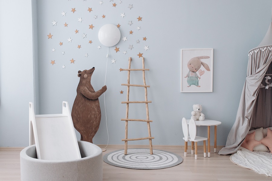 Stillbirth Quotes to Help you Cope View of a Nursery with a Bear Painted on the Wall and Stars Above It