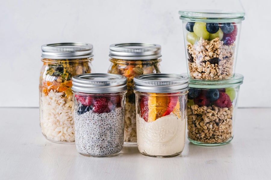 Jillian Michaels Breakfast Ideas Close Up of Mason Jars Filled with Oats and Fruits