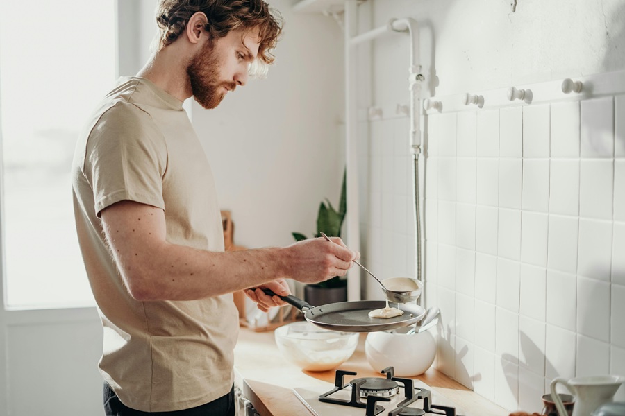 Jillian Michaels Breakfast Ideas a Man in a Kitchen Cooking Breakfast
