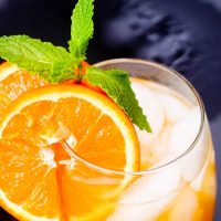 Easy Fireball Cocktail Recipe Sitting on a Black Surface