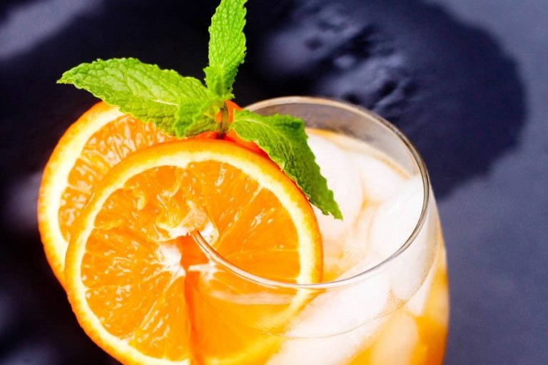 Easy Fireball Cocktail Recipe Sitting on a Black Surface