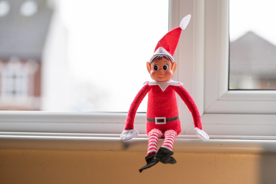DIY Elf on The Shelf Clothes Elf Sitting on a Window Sill