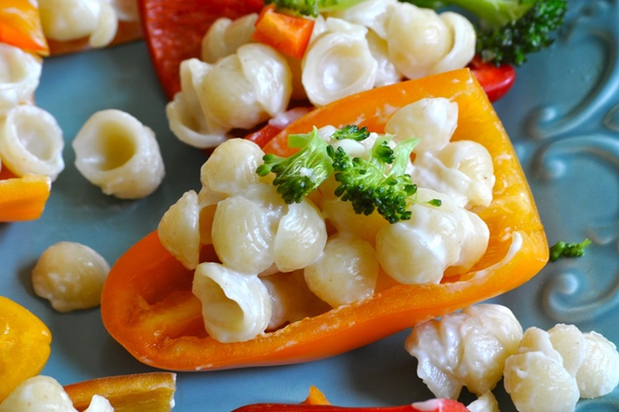 Close Up of Macaroni and Cheese Snacks with Bell Peppers 