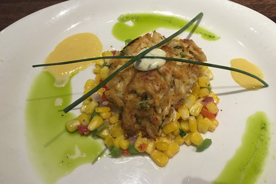 8 Fun Things to do in Delaware a Crab Cake on a White Plate