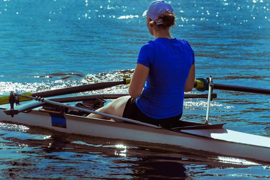 What are Standard Process Supplements a Woman Sitting in a Kayak on Water