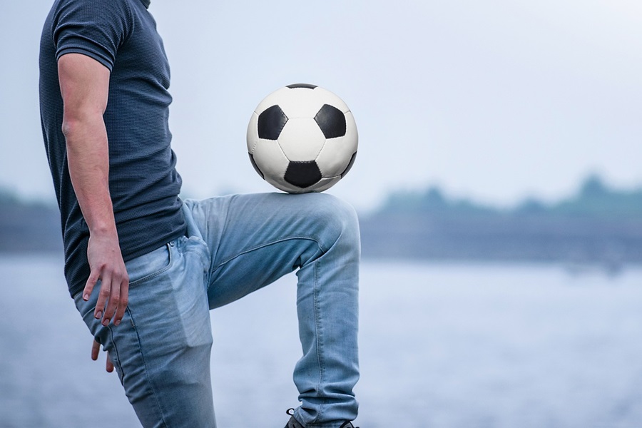 What are Standard Process Supplements a Man Lifting a Knee with a Soccer Ball Balancing on it