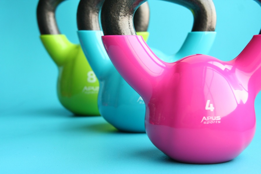 10 Minute Body Transformation Second Edition Close Up of Colorful Kettlebells 
