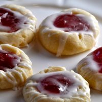 Our raspberry thumbprint cookies recipe is easy to make and the most popular cookie recipe EVER! They make the perfect dessert for parties, holiday gathering, and will be requested time and time again! Cookie Recipes | Thumbprint Cookie Recipes | What are Thumbprint Cookies | How to Make Thumbprint Cookies