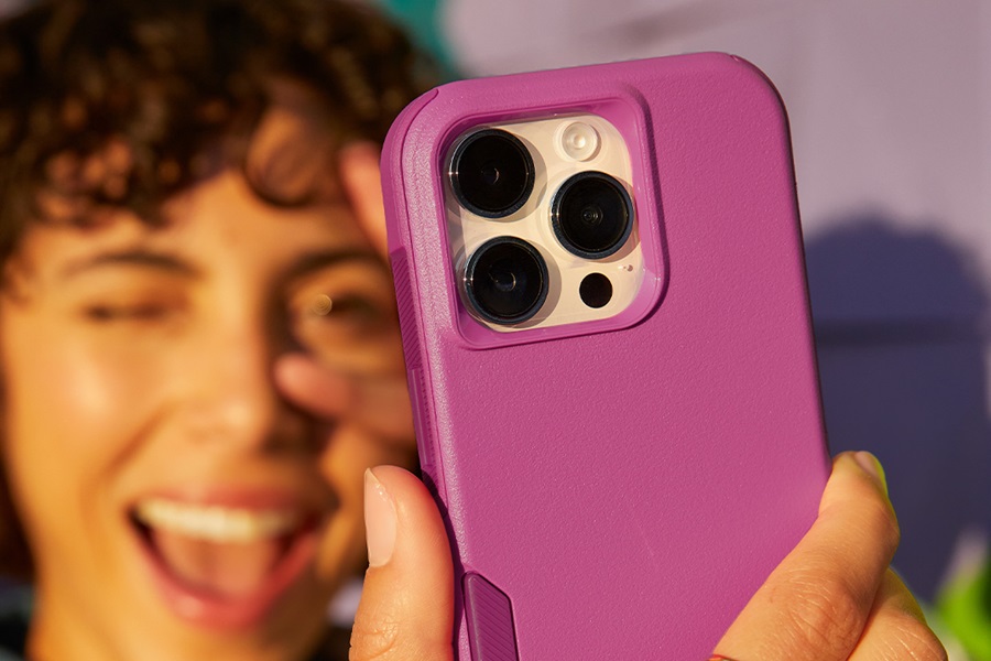 Otterbox vs Lifeproof What's the Difference Close Up of a Phone in a Case Being Held by a Woman Taking a Selfie