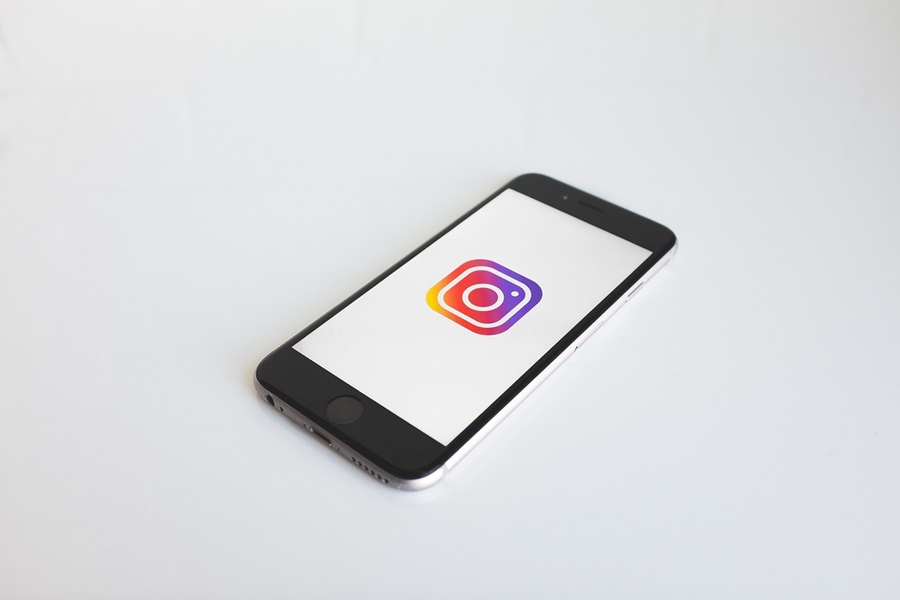 Printable Instagram Contract for Teens a Phone with Instagram on the Display on a White Surface