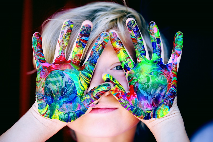 Activities for Kids Before Electronics a Child Holding His Hands in Front of His Face with Paint All Over His Palms