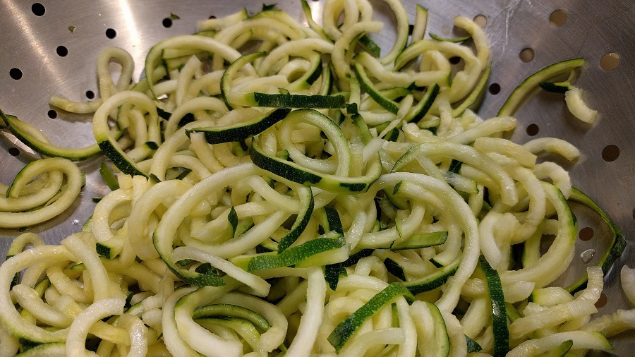 Zucchini Noodle Recipes Close Up of Zucchini Noodles in a Drainer