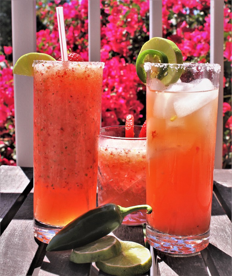 This strawberry jalapeño margarita is sweet, spicy, and totally refreshing. If you love margaritas this tequila cocktail needs to be added to your regular list of recipes! Strawberry Margarita Recipe | How to make a Margarita | Jalapeno Cocktails | Tequila Cocktail Recipes