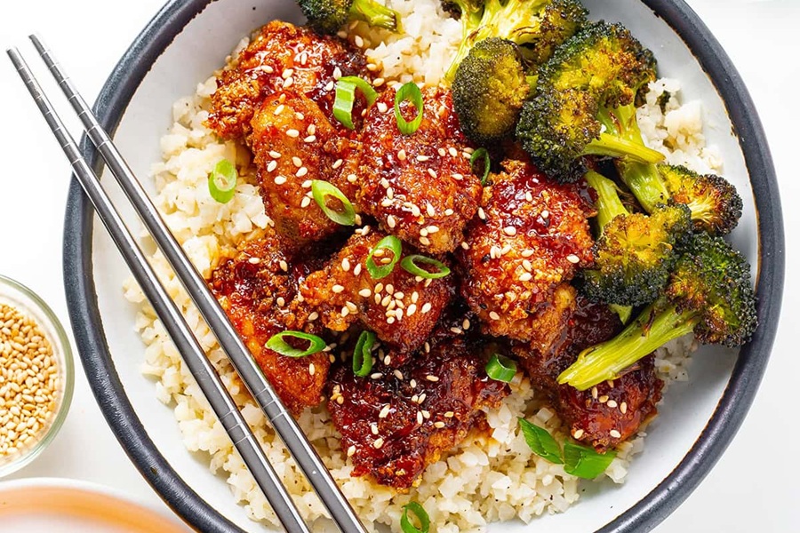 Dairy Free Ketogenic Chicken Recipes Close Up of Keto Orange Chicken in a Bowl with Quinoa