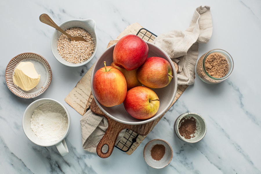 Apple Crisp with Instant Oatmeal Ingredients Spread Out in Small Bowls