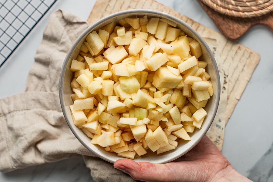 Apple Crisp with Instant Oatmeal Overhead View of a Bowl of Rinsed and Cut Up Apples