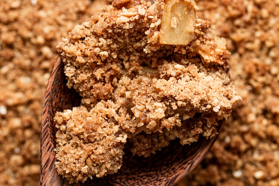 Apple Crisp with Instant Oatmeal Close Up of a Wooden Spoon Filled with Oatmeal Apple Crisp