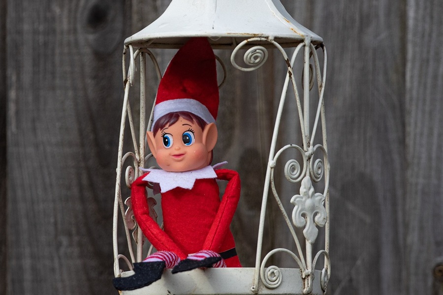 Elf on the Shelf Jar Ideas an Elf Sitting in a Empty Hanging Lantern Outside