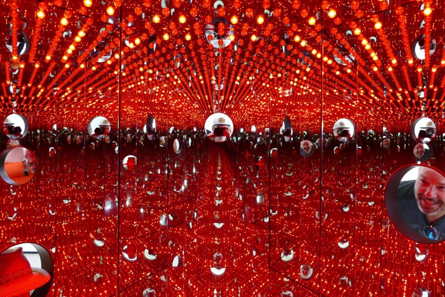 Panasonic Lumix FZ1000 Tips and Tricks an Art Installation with Mirror Balls Hanging in a Red Room