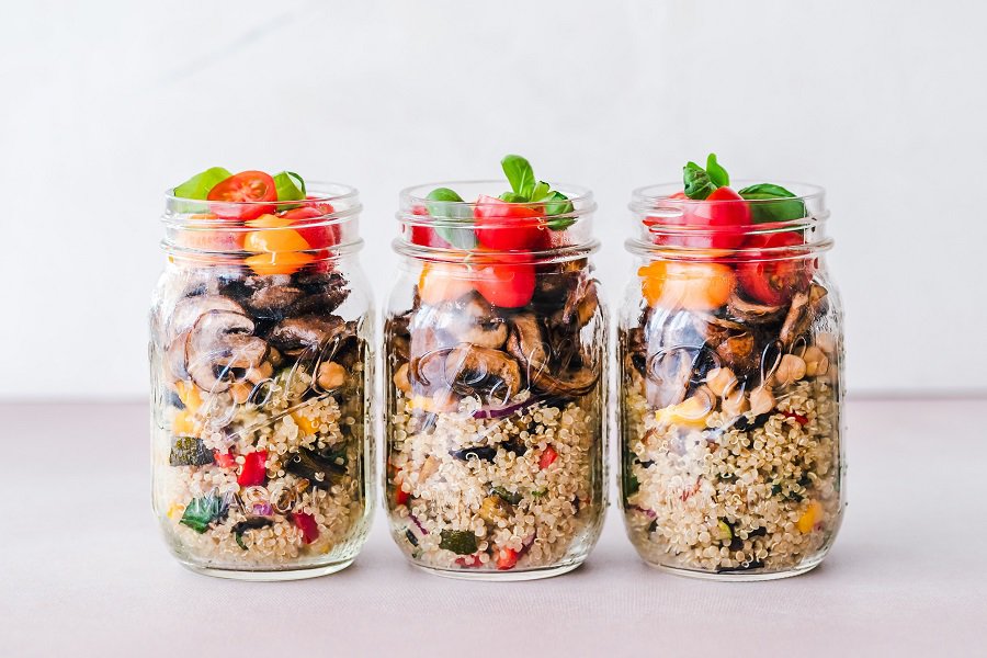On the Go Keto Snacks Mason Jars Filled with Granola and Topped with Fruit