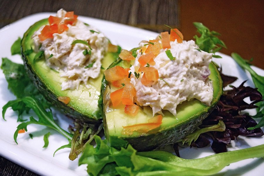 LIIFT4 Meal Plan B Recipes Close Up of an Avocado Cut in Half Stuffed with Chicken Salad