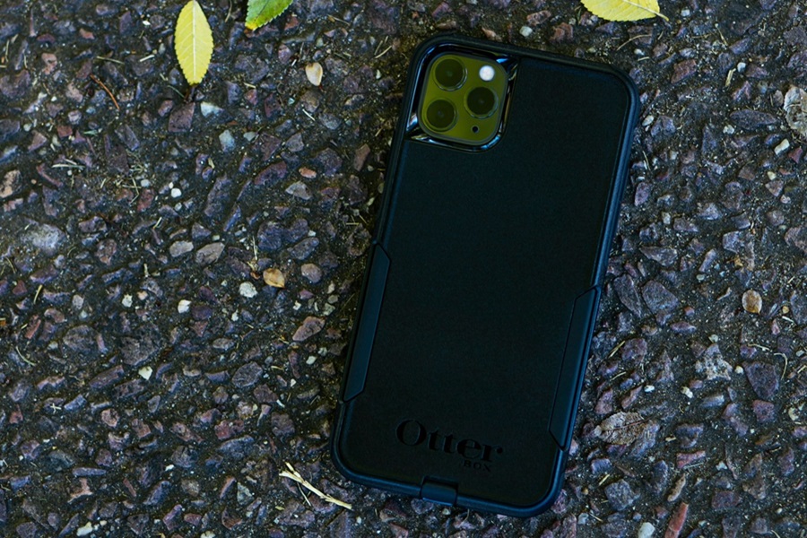 Otterbox Pursuit vs Defender Close Up of a Phone in an Otterbox Case Sitting on Cement