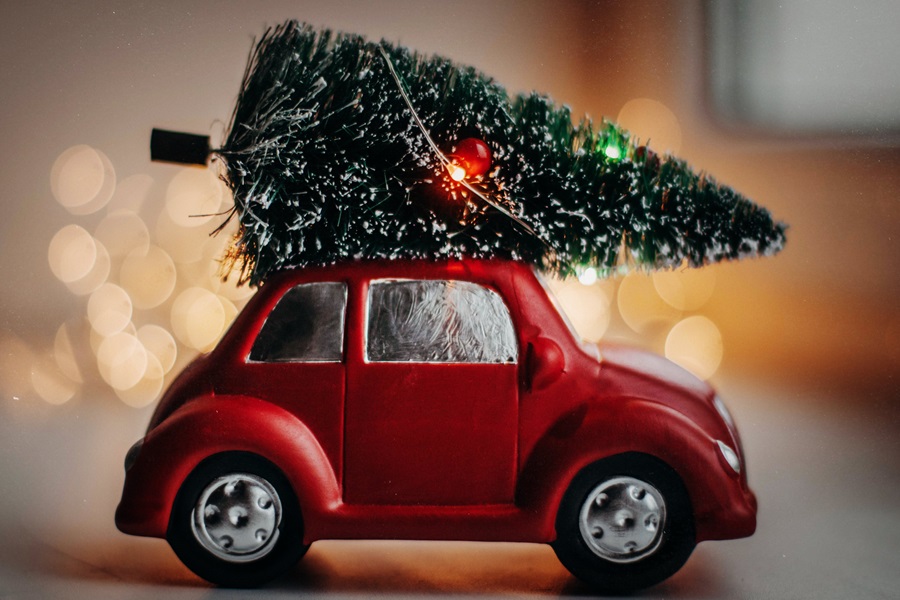 Welcome Back Elf on the Shelf Ideas a Small Red Toy Car with a Small Christmas Tree On The Roof