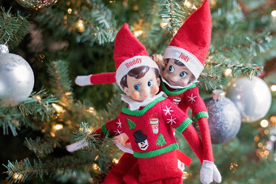 Welcome Back Elf on the Shelf Ideas Close Up of Two Elves in a Christmas Tree