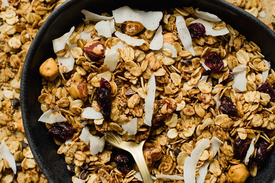 Easy Vegan Granola Recipe Close Up of Granola with Coconut Chips