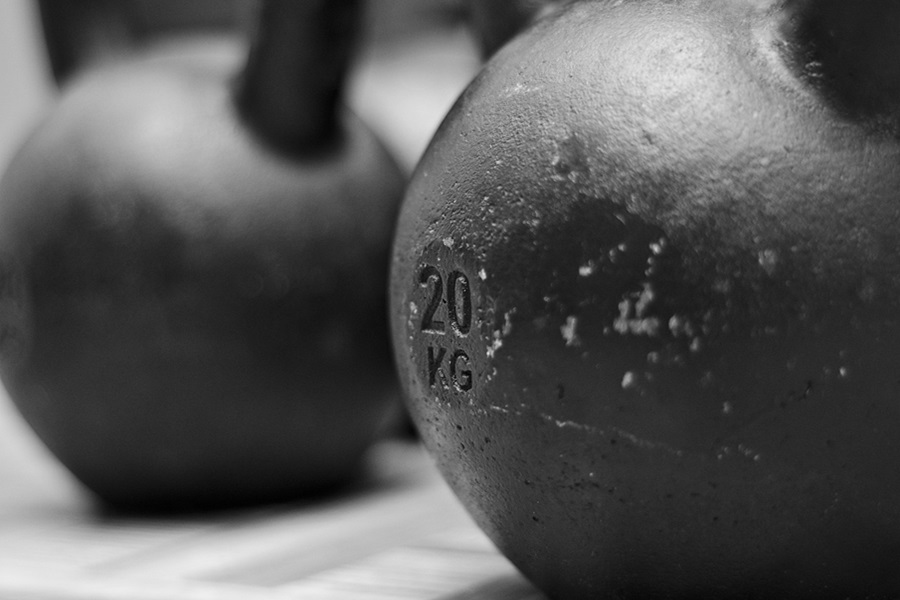 Kettlebell Exercises You Should Do Each Day Close Up of Used Kettlebells