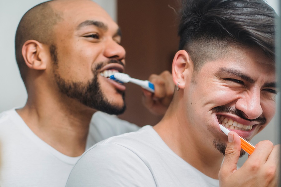 Exercises to Do While Brushing Your Teeth Two Guys Brushing Their Teeth