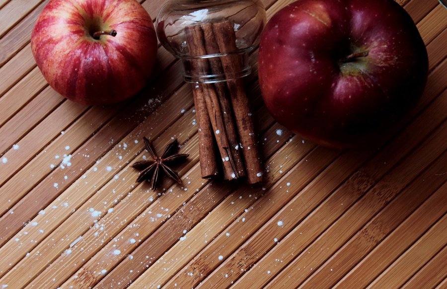 Low Sugar Snacks for a Low Carb Diet Close Up of a Bundle of Cinnamon Sticks and Two Red Apples