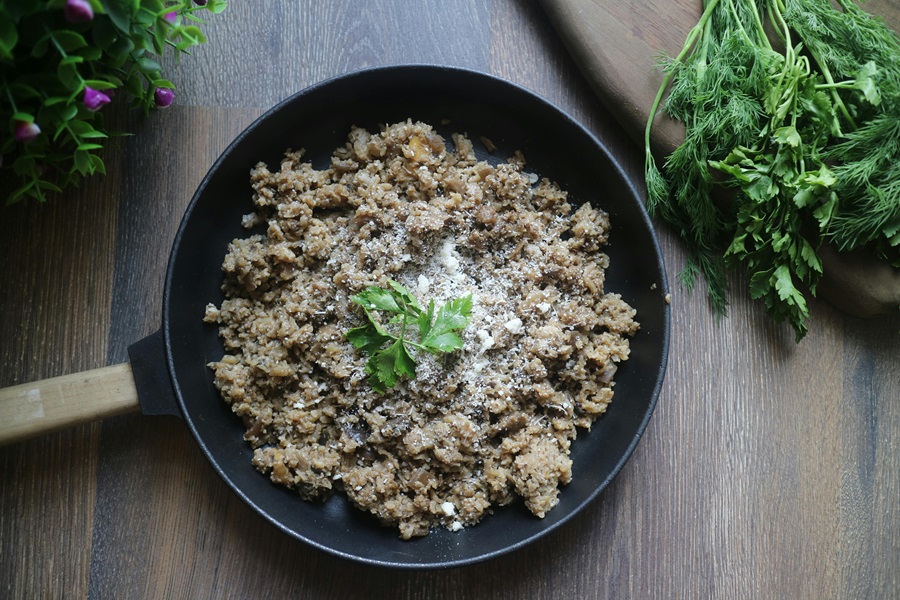 Keto Carb Limit vs Low Carb Limit a Plate of Cooked Ground Meat Topped with Cheese and Parsley 