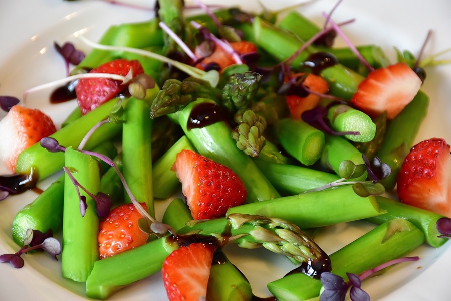 Keto Carb Limit vs Low Carb Limit Close Up of a Green Bean Salad with Strawberries