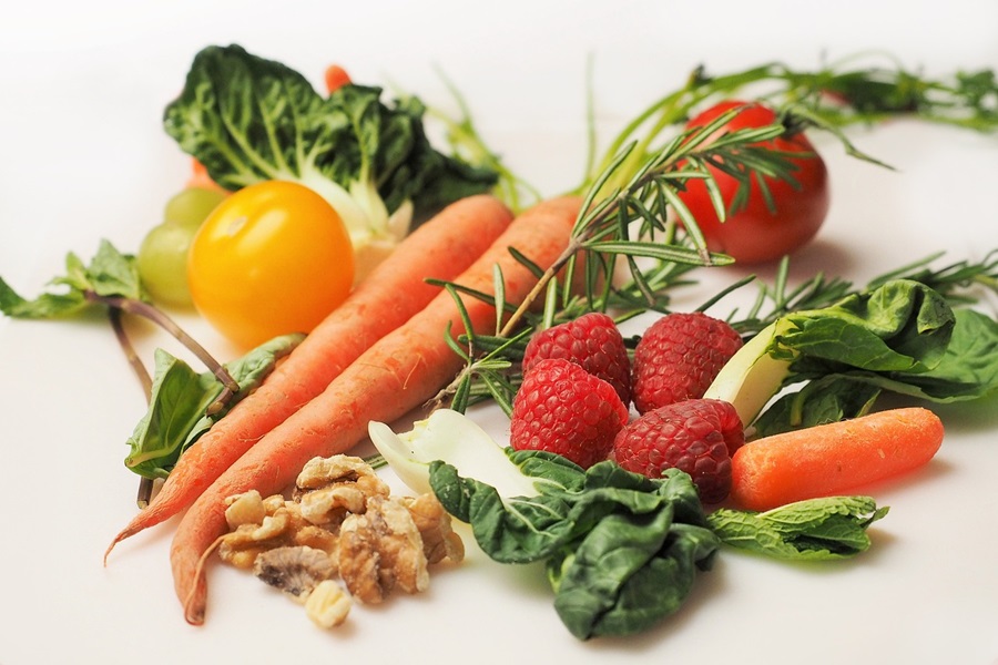 What is a Pegan Diet Fresh Veggies and Fruits on a White Surface
