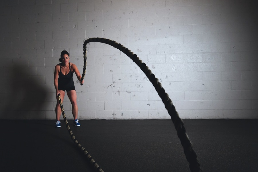 Transform 20 Week 3 Workouts and Tips a Woman Doing Ropes in a Gym