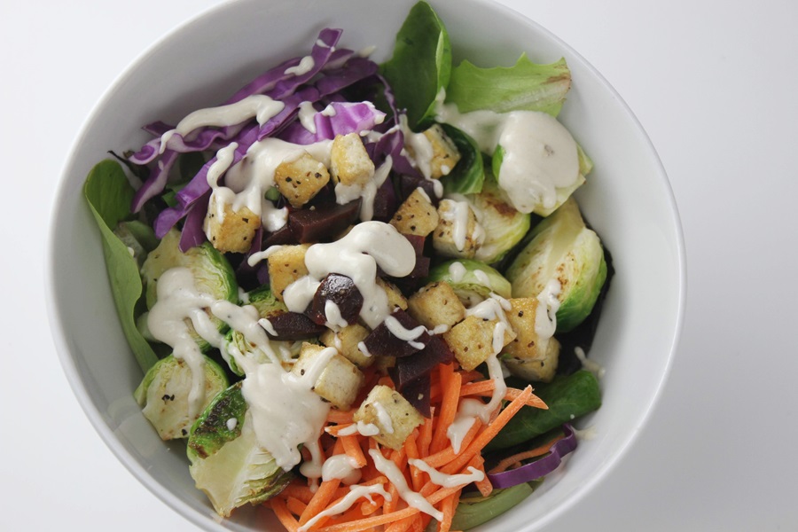 2B Mindset Buddha Bowl with Dairy Free Sauce Overhead View of a Buddha Bowl