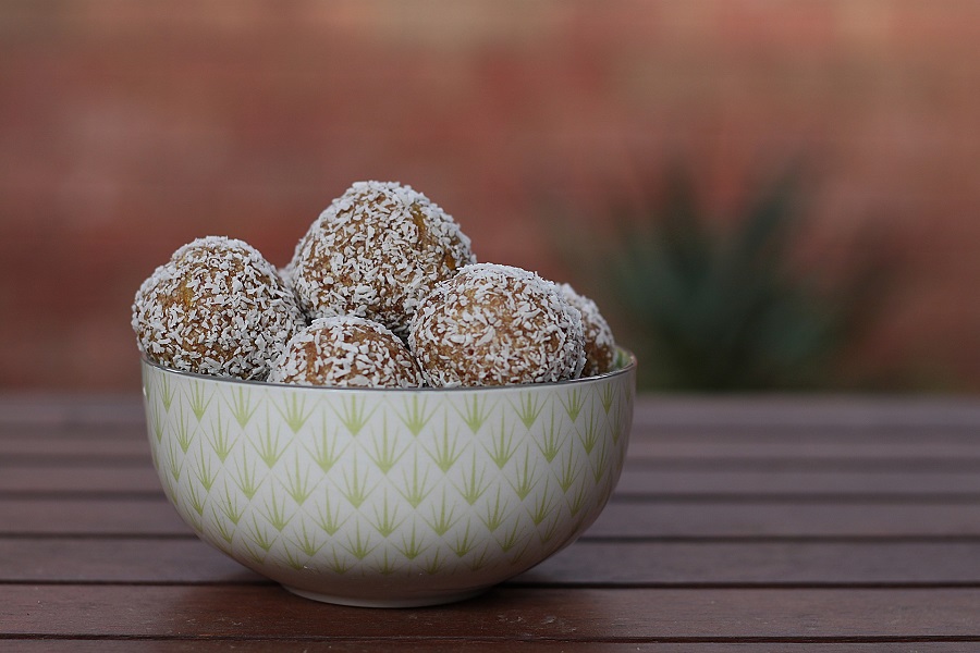Low Carb Protein Balls Close Up of a Bowl of Protein Balls Covered in White Powder