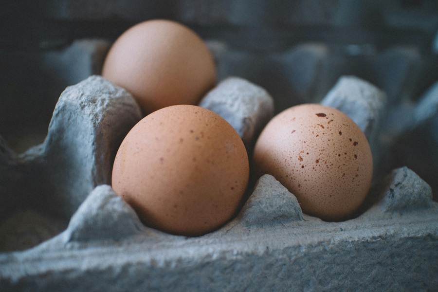 Low Carb Overnight Breakfast Casserole Crockpot Recipe Close Up of a Eggs in a Carton