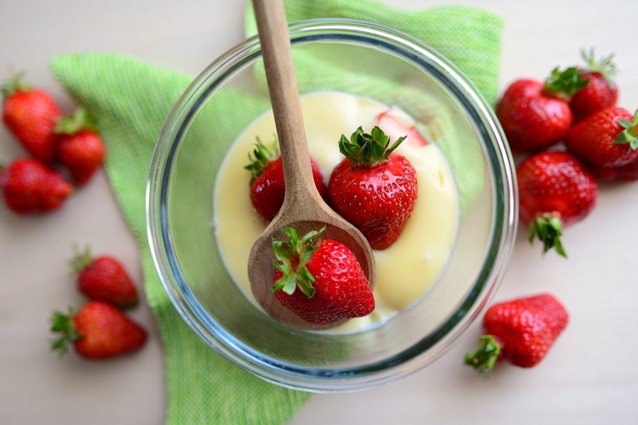 Easy Low Carb 2 Ingredient Desserts Close Up of a Bowl of Pudding with Strawberries on Top