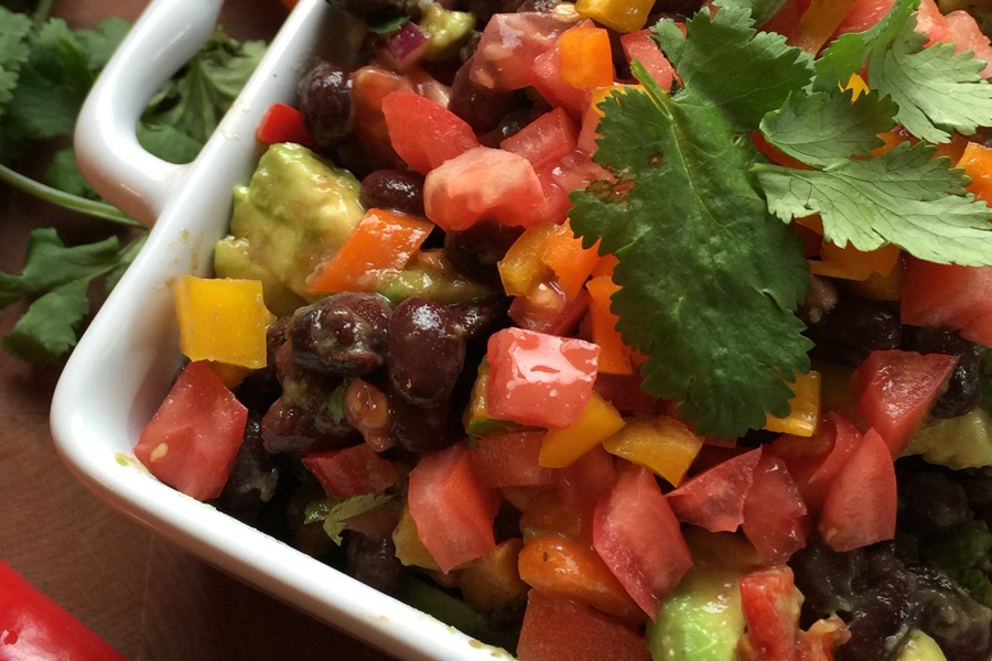 Easy Low Carb Cowboy Caviar Recipe Close Up of Diced Tomatoes, Avocado, Cilantro, Beans and Bell Peppers