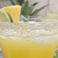 Fresh Pineapple Margarita Recipe without Triple Sec Close Up of the Rim of a Glass with Pineapple Margarita Inside