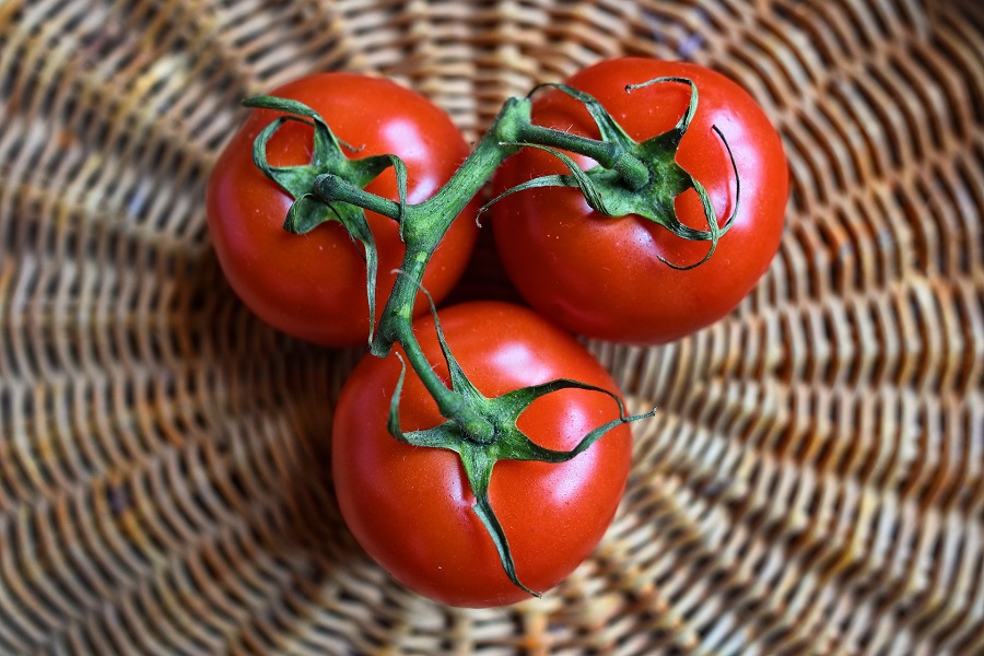 2B Mindset Crock Pot Recipes Overhead View of a Few Tomatoes in a Wicker Basket Bowl