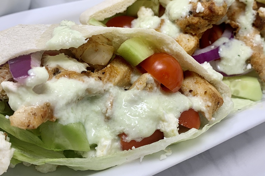 Close Up View of Chicken and Tzatziki in Pita Pockets 