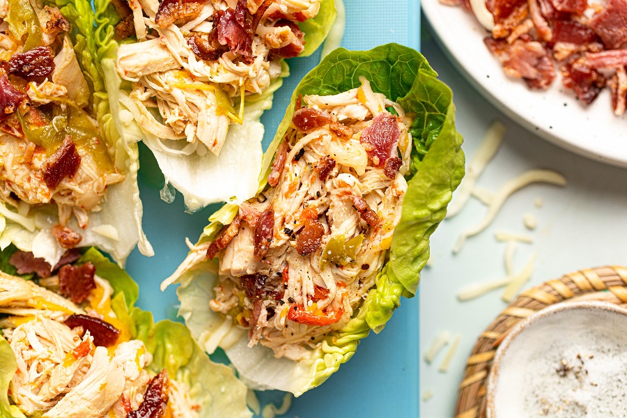Crockpot Chicken and Bacon Keto Overhead View of a Blue Platter Filled with Lettuce Wraps